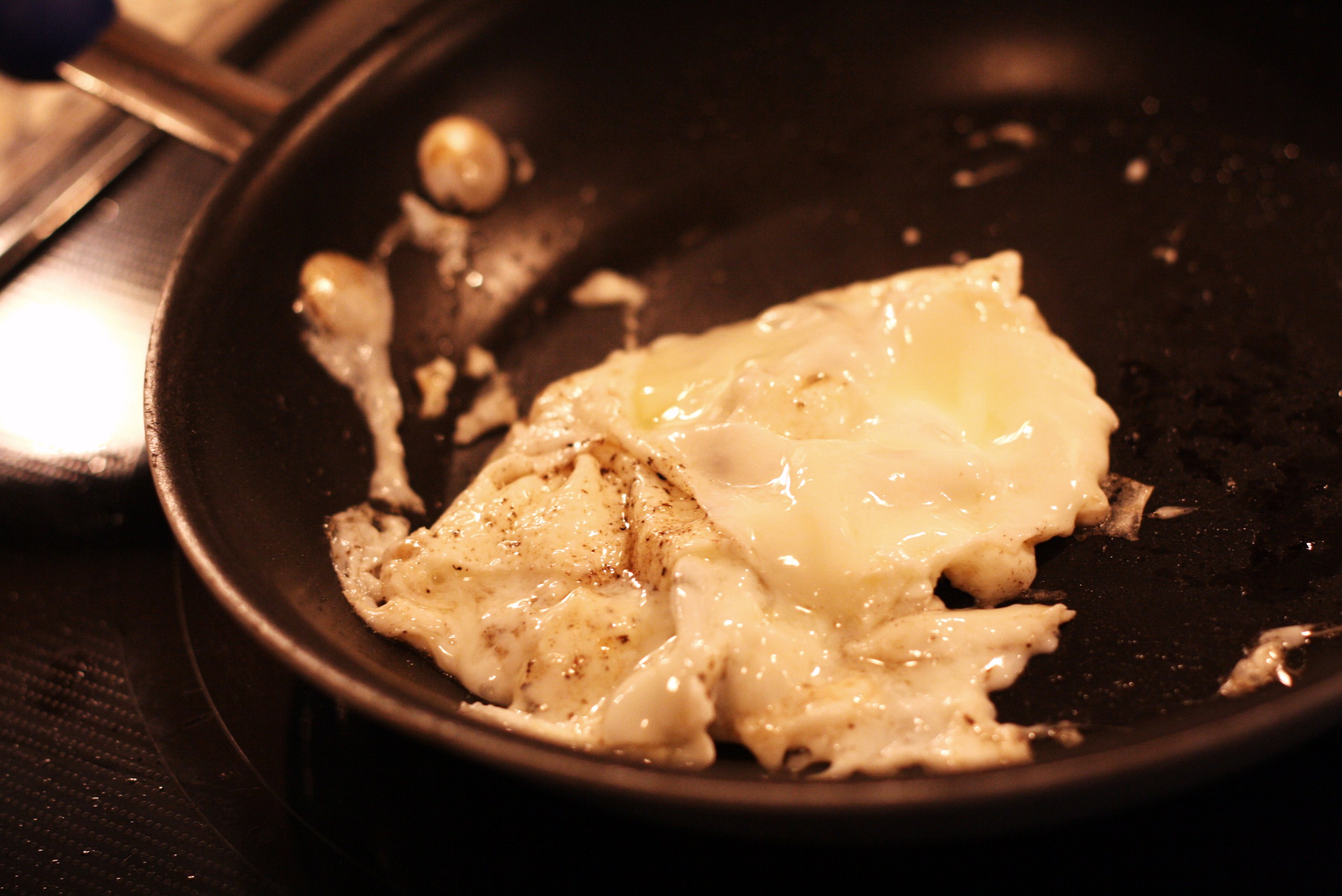 Pour egg whites into the skillet and cook on low to medium heat.  When the egg whites start turning opaque, give the eggs a stir and to press the eggs together and make a patty-like shape.  Cook a moment and then turn the egg-patty over to make sure the egg whites are cooked through.  If you are cooking a whole egg, make sure the yolk is cooked through, otherwise your sandwich will be runny.  Remove from pan and start to assemble your sandwich.