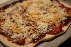 Top pizza with cheeses.