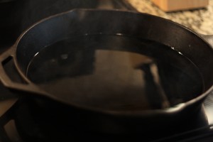 Pour vegetable oil into skillet.  (I poured in enough to create about ¼-½ inch of oil.)  Heat the oil to 350 degrees. Fahrenheit.