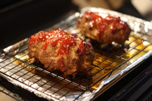 Remove from oven and allow to rest for about 10-15 minutes.  This will help keep your meatloaf from falling apart when cutting into slices. 