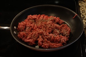 Brown ground beef in skillet.  Add ¼ tsp salt, 1/2 tsp ground black pepper,  ½ tsp oregano, and 1/8 tsp allspice.  Stir to combine.  Drain the grease from the pan. 