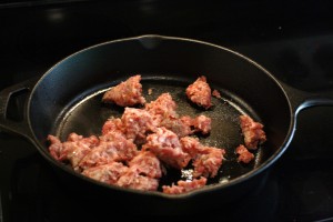 Brown the ground sausage in a preheated skillet on medium-high heat.  Add ½ of the spice mix to the sausage and stir to combine.  You can add the spices when you add the sausage to the skillet.