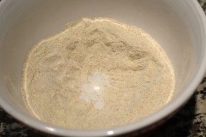 Next, form a small well in the flour mixture.