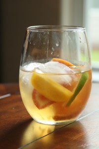 Place a few ice cubes into a glass (it looks really cute is small mason jars), and pour sangria over ice. Serve.