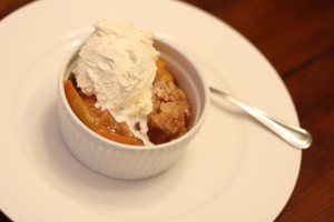 Spoon the some of the crisp into a serving dish, and top with a scoop of vanilla ice cream.