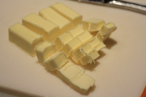 Cut the 1/3 cup butter into small cubes.