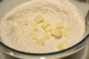 Add the cubed butter to dry ingredients.