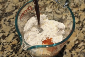 Combine the powdered sugar, 4 tbsp milk, and vanilla extract.  I use a fork to stir.