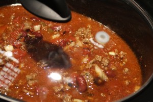Place the lid on the slow-cooker.  Cook on low for 8 hours.  After the chili has cooked for 8 hours, turn the slow-cooker to warm, so the chili stays nice and hot during the big game and everyone can serve themselves.