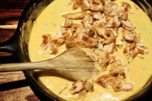 Stir the chicken into the cheese sauce.