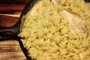 Add in the pasta and pasta water.  Stir/toss to combine completely.