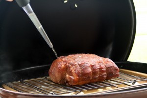 Baste the pork shoulder every ½ hour to 1 hour.  Fill water pan as water evaporates.  Cook until the internal temperature of pork roast reaches 190 degrees Fahrenheit.  This can take several hours.