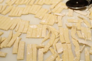 I take the scraps and trim them up a little neater and cut them into noodles as well.