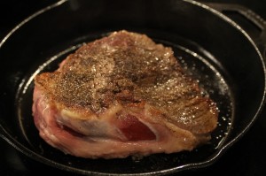 Add an extra drizzle of extra virgin olive oil to skillet.  Next, place the shoulder roast into the skillet to sear each side.  About 2 minutes per side.  We aren’t cooking the roast through, simply just getting a little crust on it.  It will finish cooking in the slow cooker.