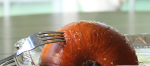 The pumpkin is done when you can easily insert a fork into the pumpkin (the side with the skin still on). 