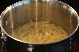 Cook the pasta according to box instructions. Then drain the water from the pasta. 