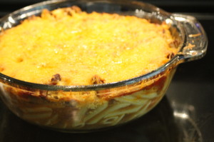 Remove the chili casserole from the oven and allow to set for about 10 minutes.  Use caution when removing from the oven, the dish will be extremely hot; use your oven mitts!