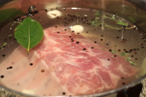 Submerge the roast into the brine solution.  Refrigerate the pork in the brine solution for 24 hours. 