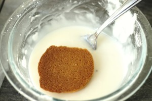 Dip Orange Cookies in Icing