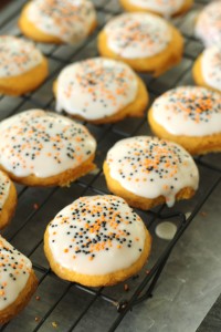 Sprinkles on Dipped Orange Cookies