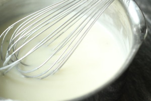 Stir in milk for cheese sauce