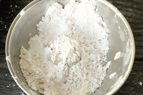 Toss snowball in powdered sugar mix
