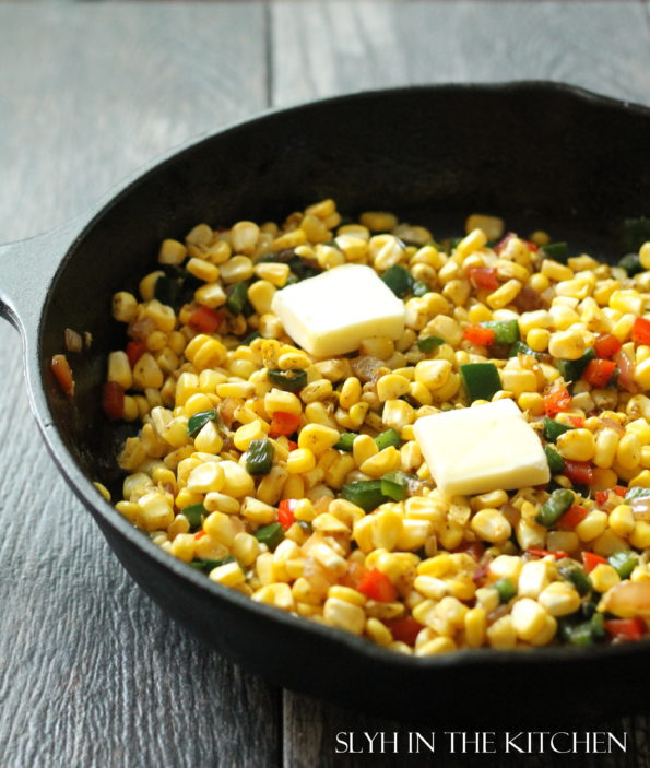 Add butter to corn and peppers